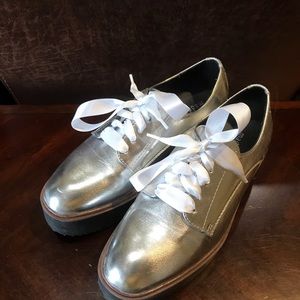 Madden Girl silver platform shoe
